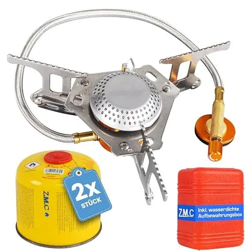 Produktbild: Z.M.C Mini Campingkocher, transportabler Kartuschenkocher, Gaskocher aus rostfreiem Stahl mit Aufbewahrungsbox mit 2x Gaskartuschen 3700W, Verbrauch 213g/h Piezo-Zündung, für Outdoor Aktivitäten